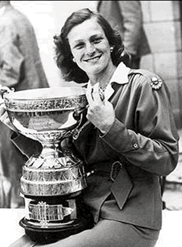 Babe Didrikson holding her All American trophy  (https://www.nwhm.org/ ())